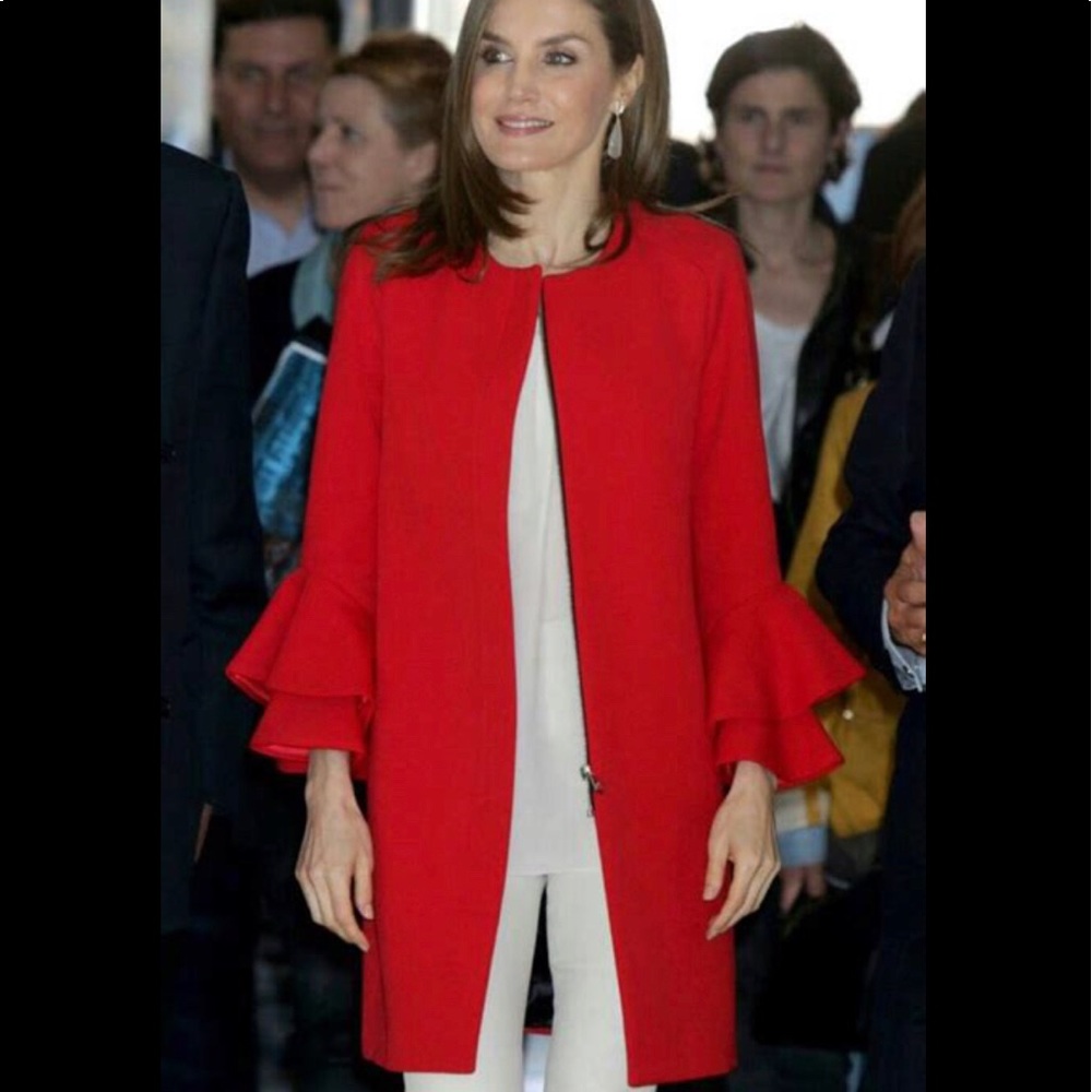 Red jacket with ruffle sleeves
